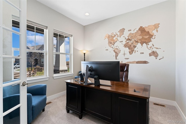 office featuring baseboards, recessed lighting, visible vents, and light carpet