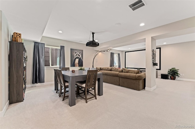 dining room featuring visible vents, recessed lighting, baseboards, and light carpet