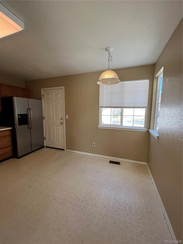 view of unfurnished dining area