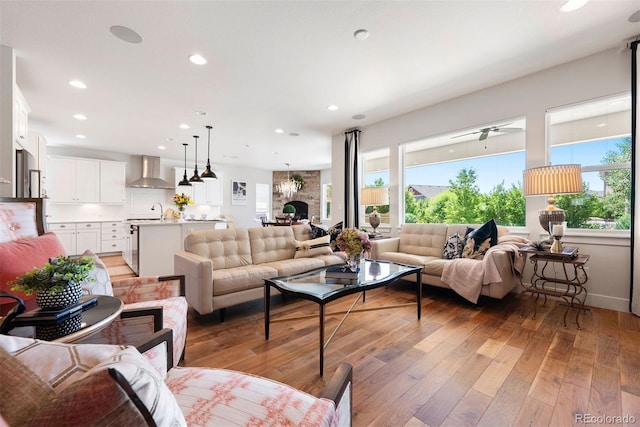 4142 Saltbrush Ct, Loveland, CO 80538 - living area with light wood finished floors and recessed lighting