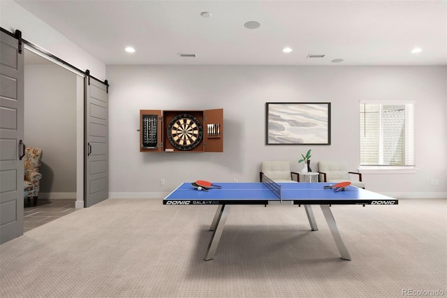 4142 Saltbrush Ct, Loveland, CO 80538 - game room featuring a barn door, carpet, and recessed lighting