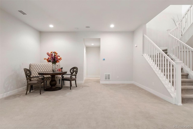 4142 Saltbrush Ct, Loveland, CO 80538 - dining area featuring light colored carpet, stairway, and recessed lighting