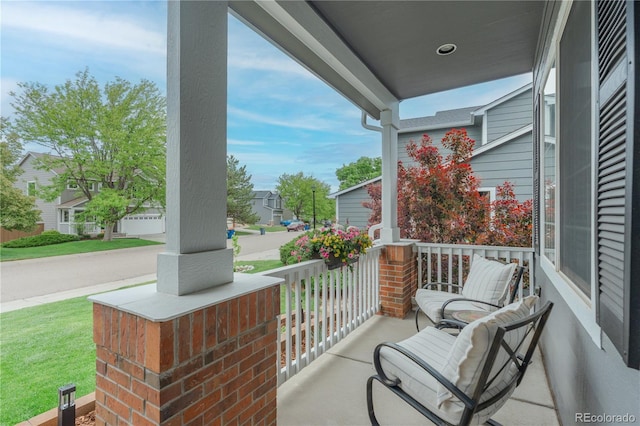 9884 Sydney Ln, Highlands Ranch, CO 80130 - covered porch with a residential view
