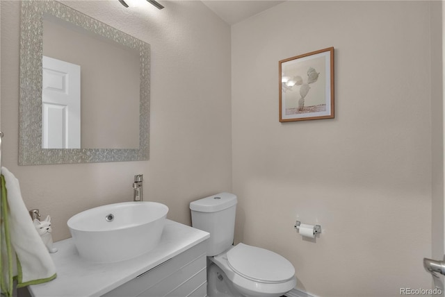 9884 Sydney Ln, Highlands Ranch, CO 80130 - half bath featuring toilet and vanity