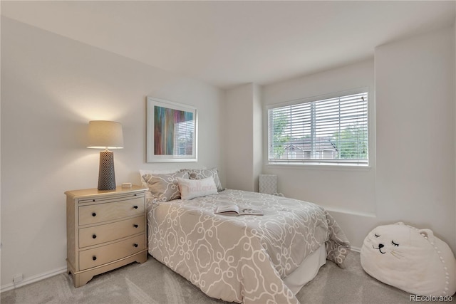 9884 Sydney Ln, Highlands Ranch, CO 80130 - bedroom featuring light colored carpet and baseboards