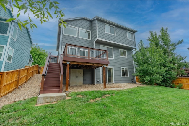 9884 Sydney Ln, Highlands Ranch, CO 80130 - rear view of property featuring a deck and stairs