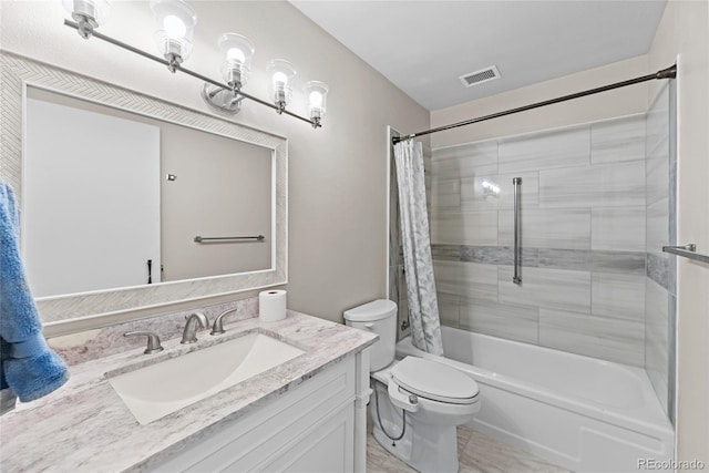 full bathroom featuring vanity, toilet, and shower / bath combo with shower curtain