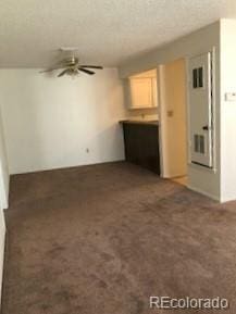 2355 E Geddes Ave Unit G24, Centennial, CO 80122 - unfurnished living room featuring ceiling fan and carpet flooring