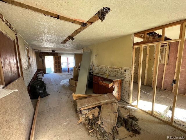 misc room with a textured ceiling