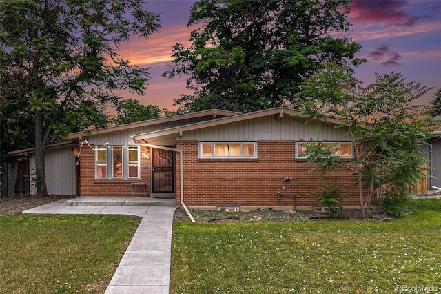 400 W Midway Blvd, Broomfield, CO 80020 - view of front facade featuring a front yard and brick siding