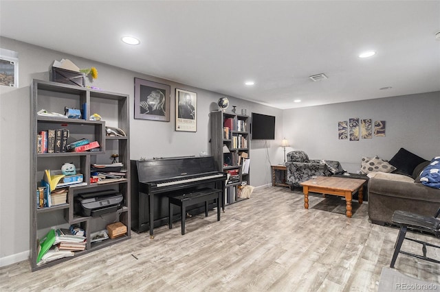 400 W Midway Blvd, Broomfield, CO 80020 - living area with light wood-style flooring and recessed lighting