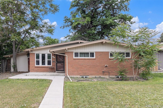 400 W Midway Blvd, Broomfield, CO 80020 - view of front of house with brick siding