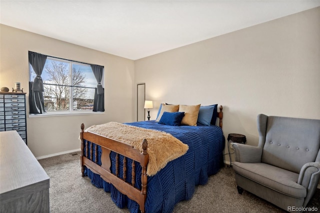 bedroom featuring carpet floors and baseboards