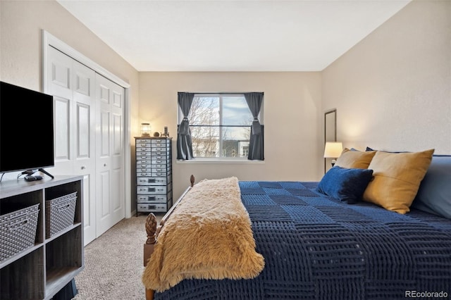 bedroom featuring a closet and carpet
