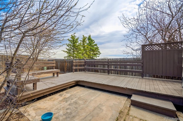 deck with fence and a patio area