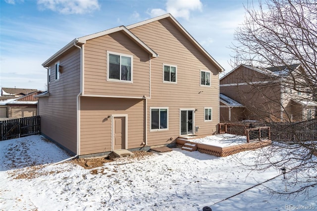 view of snow covered property