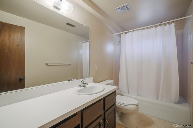 full bathroom with shower / tub combo, vanity, tile patterned floors, and toilet