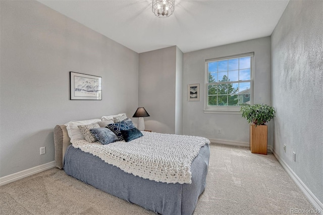 581 Stonemont Dr, Castle Pines, CO 80108 - bedroom featuring light carpet and baseboards