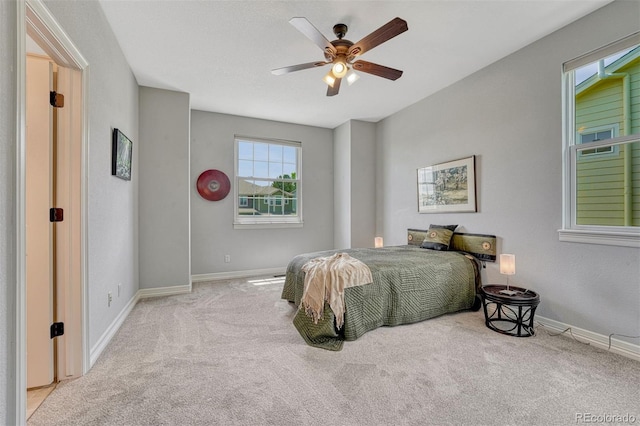 581 Stonemont Dr, Castle Pines, CO 80108 - carpeted bedroom with baseboards and ceiling fan