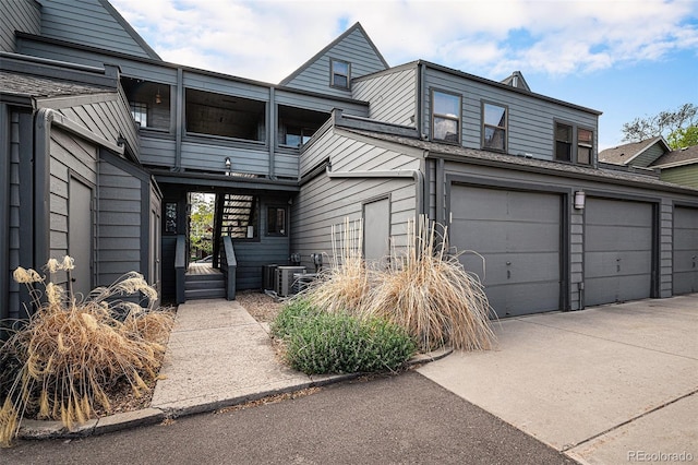 2 Acoma St Unit 11, Denver, CO 80223 - multi unit property with central AC unit and driveway