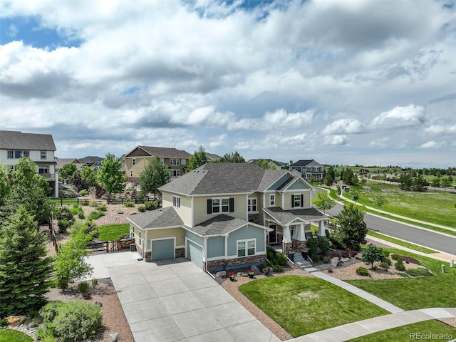 23451 E Rockinghorse Pkwy, Aurora, CO 80016 - craftsman house with stone siding, driveway, a garage, a residential view, and roof with shingles
