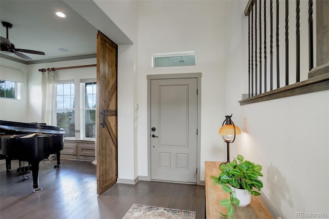 23451 E Rockinghorse Pkwy, Aurora, CO 80016 - foyer with ceiling fan, dark wood finished floors, and recessed lighting