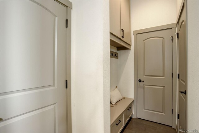 23451 E Rockinghorse Pkwy, Aurora, CO 80016 - mudroom with dark wood finished floors