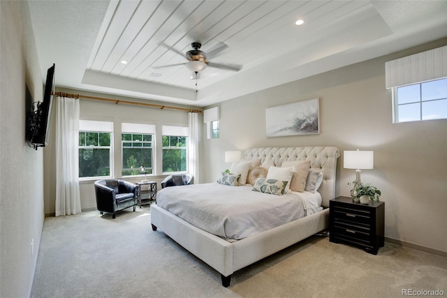 23451 E Rockinghorse Pkwy, Aurora, CO 80016 - bedroom with a raised ceiling, carpet flooring, baseboards, ceiling fan, and recessed lighting