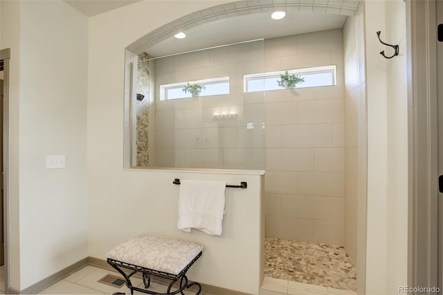 23451 E Rockinghorse Pkwy, Aurora, CO 80016 - full bath featuring walk in shower, healthy amount of natural light, and baseboards