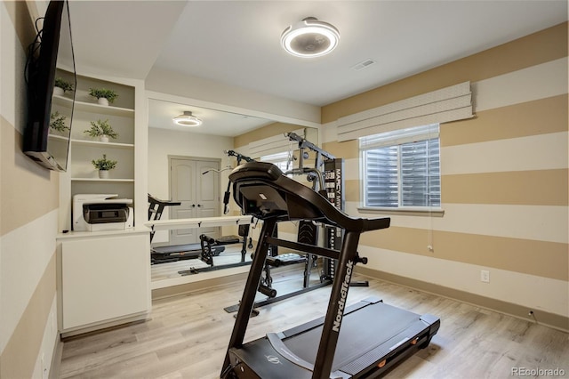 23451 E Rockinghorse Pkwy, Aurora, CO 80016 - exercise room with light wood finished floors and baseboards