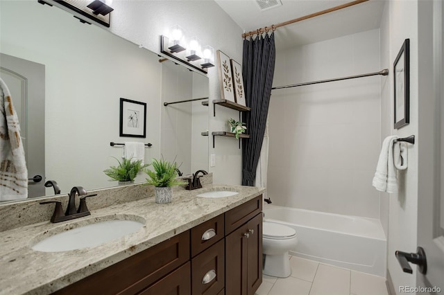 23451 E Rockinghorse Pkwy, Aurora, CO 80016 - bathroom featuring toilet, shower / bath combo, double vanity, and tile patterned flooring