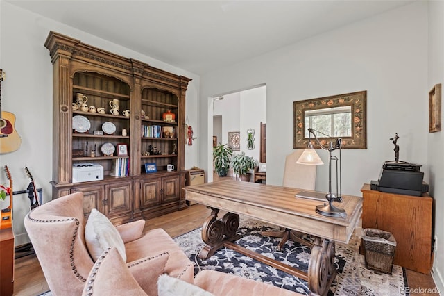 10525 Wild Fox Pl, Franktown, CO 80116 - home office with wood finished floors