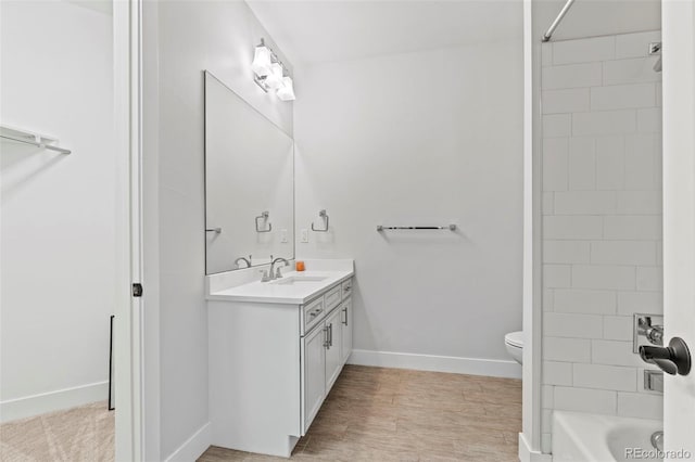10525 Wild Fox Pl, Franktown, CO 80116 - bathroom featuring vanity, shower / bathtub combination, and wood finished floors