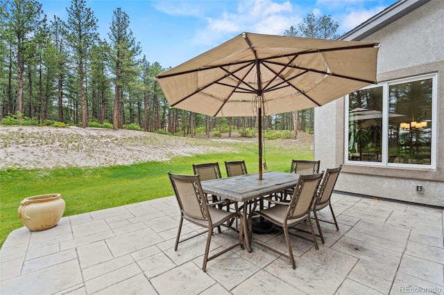 10525 Wild Fox Pl, Franktown, CO 80116 - view of patio / terrace featuring outdoor dining space