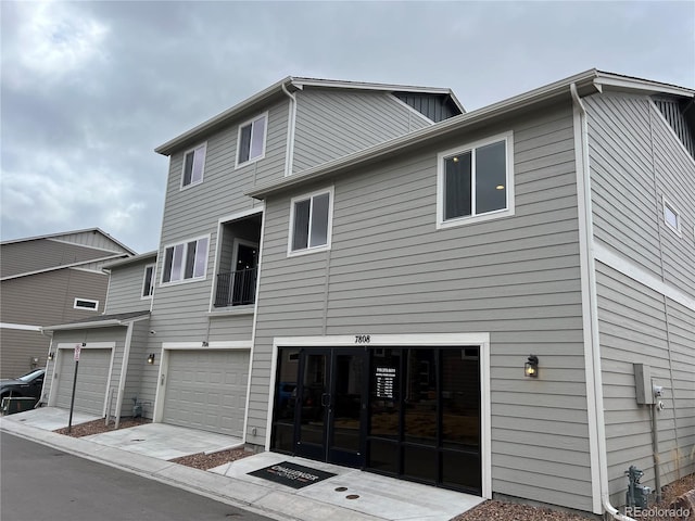 exterior space with a garage