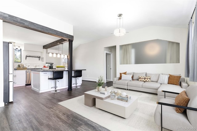 8367 S Reed St Unit A3, Littleton, CO 80128 - living room featuring dark wood-style flooring, plenty of natural light, and a baseboard radiator