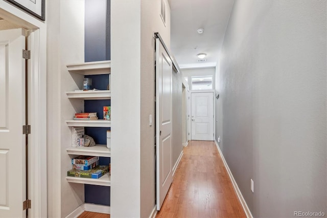 hall featuring wood-type flooring