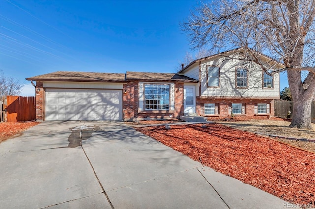 tri-level home featuring a garage