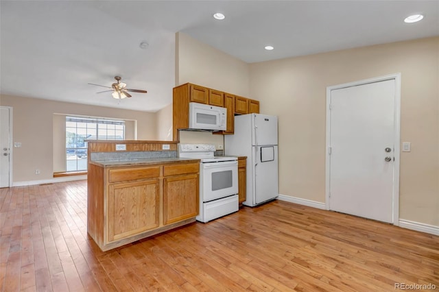 kitchen with ceiling fan, white appliances, kitchen peninsula, and light hardwood / wood-style floors