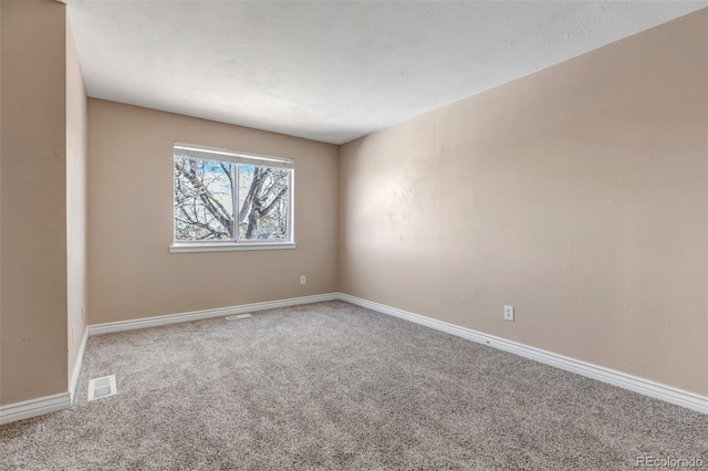 view of carpeted spare room