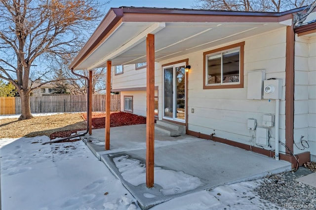 view of snow covered patio