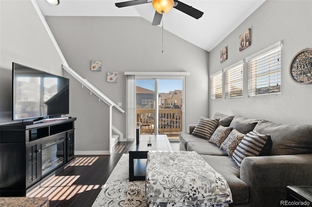 living room with ceiling fan, dark hardwood / wood-style floors, and high vaulted ceiling