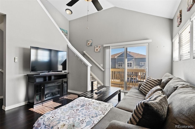 living room with high vaulted ceiling, dark wood-type flooring, and ceiling fan