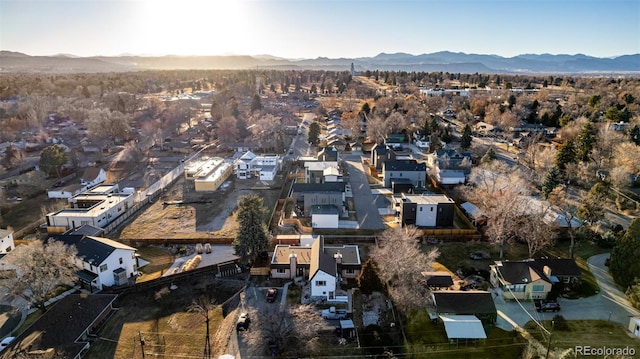 drone / aerial view featuring a residential view and a mountain view