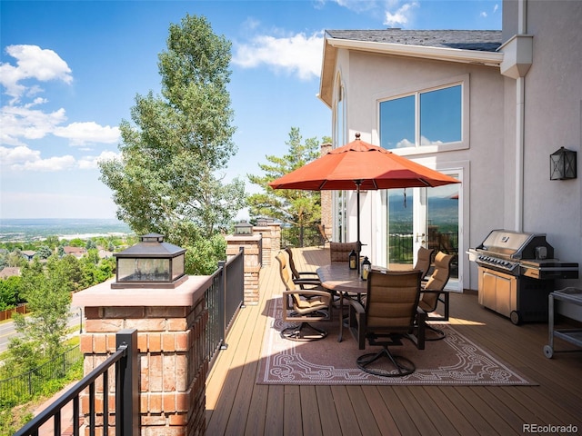 deck featuring area for grilling and a gazebo