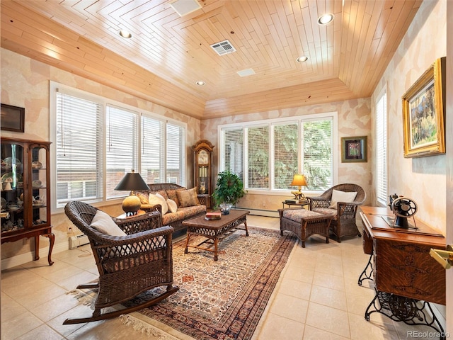 living room with wood ceiling and a baseboard heating unit