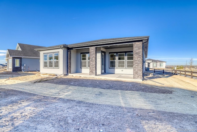 view of front of property with a patio