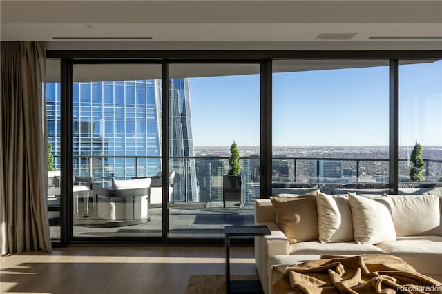 living room featuring hardwood / wood-style flooring and plenty of natural light