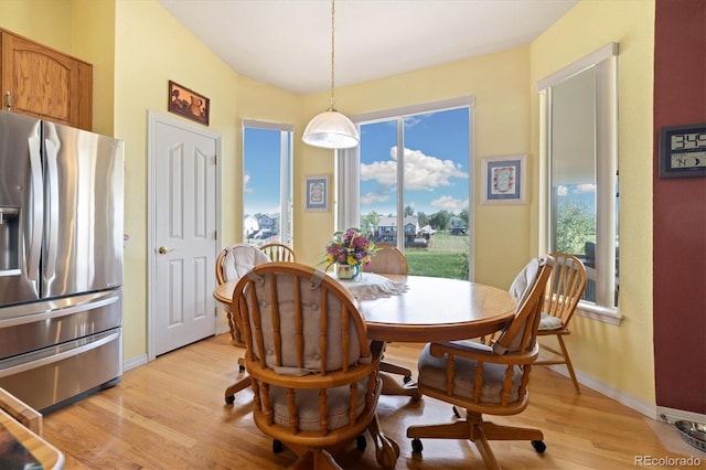 12522 Locust Way, Thornton, CO 80602 - dining area with light wood-style floors and baseboards