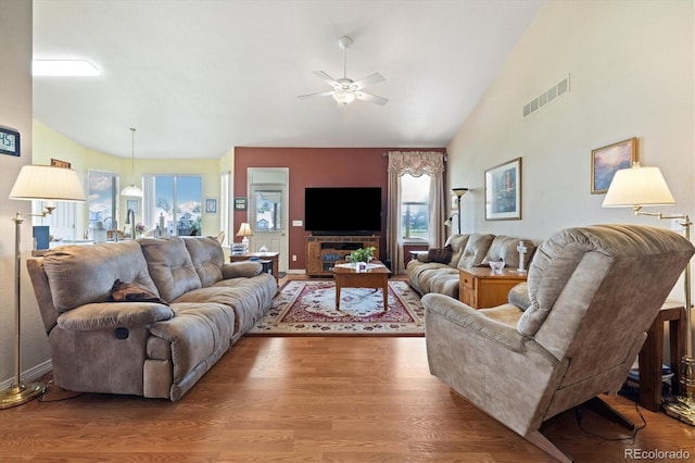 12522 Locust Way, Thornton, CO 80602 - living room featuring plenty of natural light, a ceiling fan, wood finished floors, and lofted ceiling